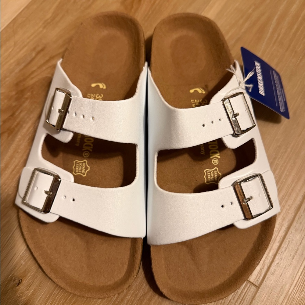 Women’s white sandals, size 38. NWT